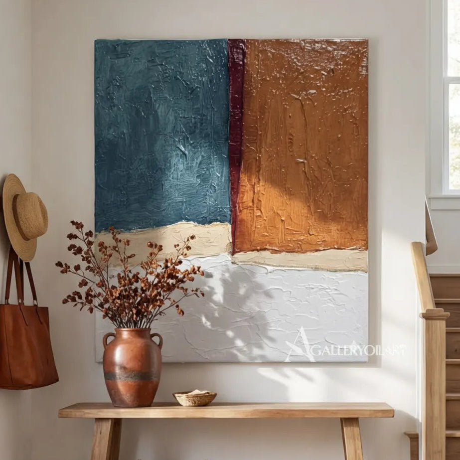 balanced-blue-rust-and-ivory-abstract-fields-with-raised-paint-texture-in-a-modern-interior