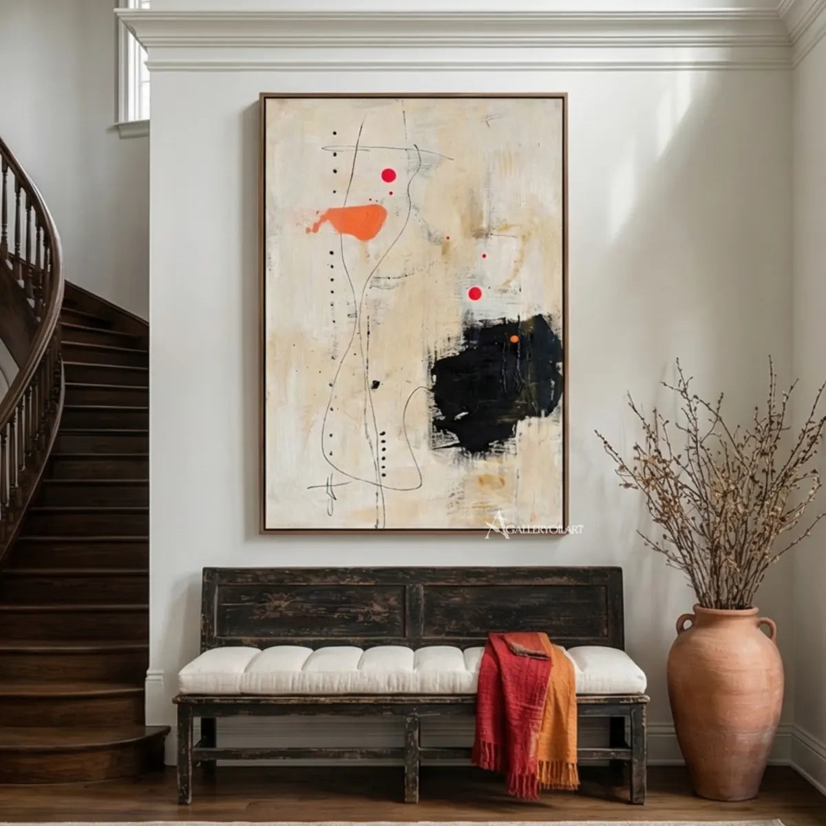 abstract-layered-abstract-marks-cream-soft-gray-charcoal-black-and-vivid-orange-wall-art-in-bench-wall