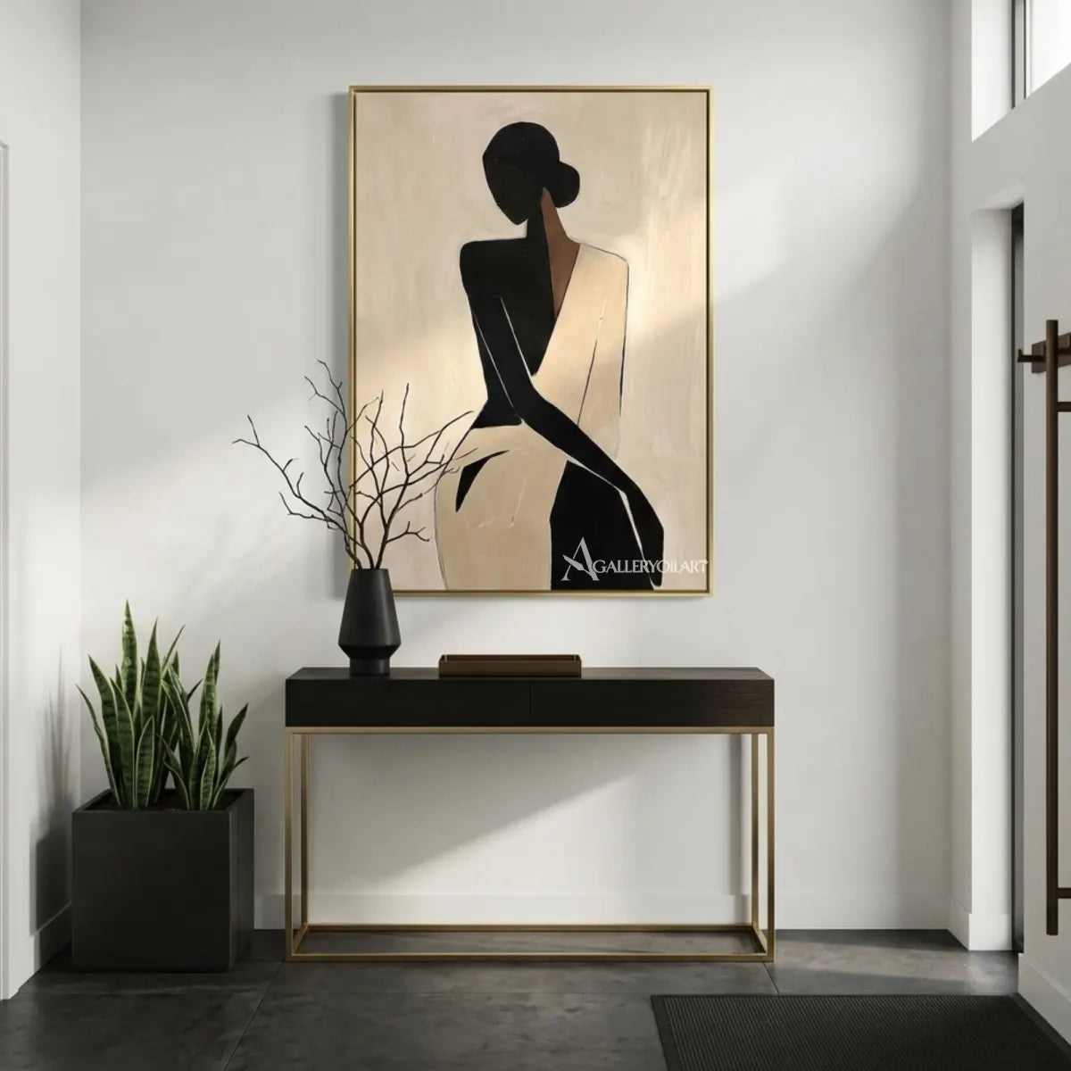 Black-silhouette-of-woman-in-flowing-dress-portrait-art-displayed-in-a-modern-corridor-with-neutral-tones