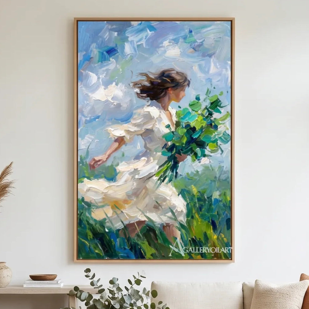woman-in-flowing-dress-portrait-art-blue-and-white-wall-art-in-a-bright-living-room