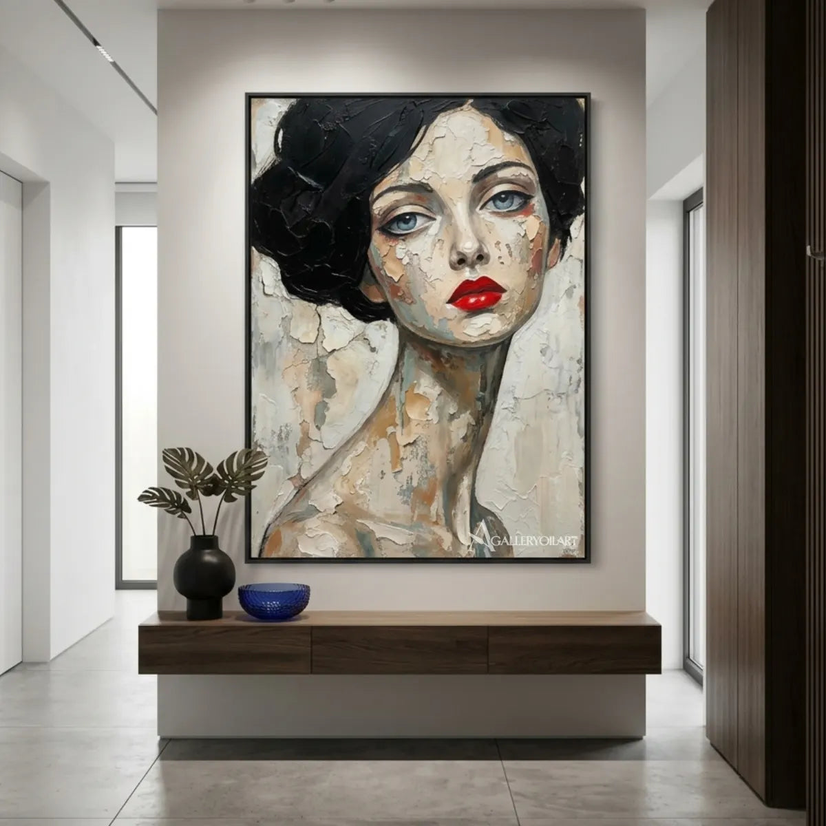 Close-up-woman-with-dark-curled-hair-and-red-lips-portrait-art-above-a-console-in-a-bright-hallway