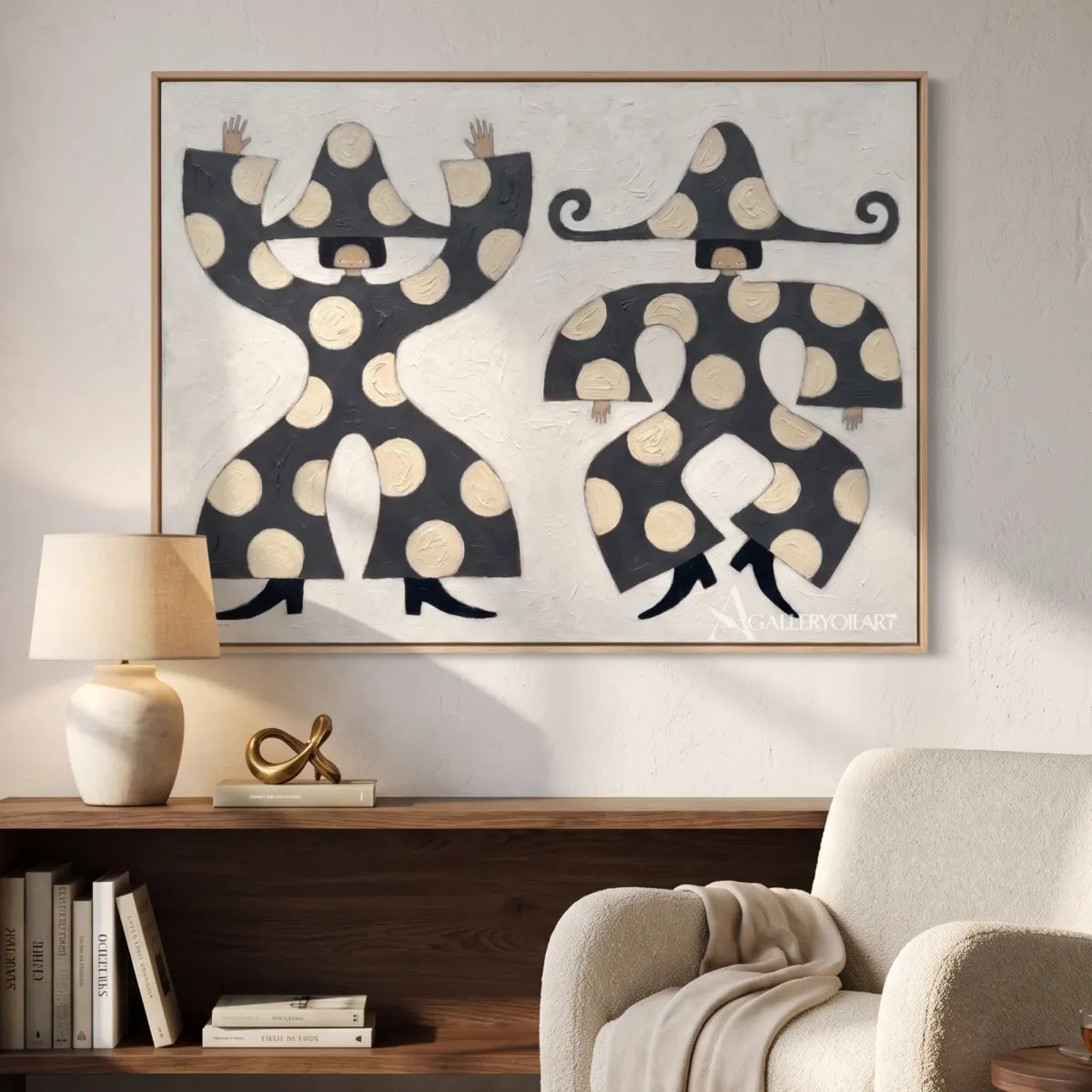 folk-art-pair-in-black-and-cream-above-a-sofa-in-a-bright-living-room