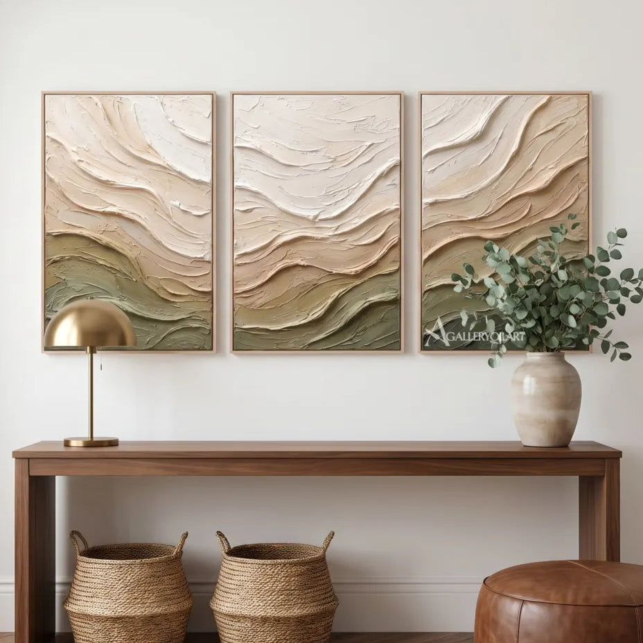 Textured-3D-layered-ridge-triptych-in-beige-and-olive-relief-in-a-modern-entryway