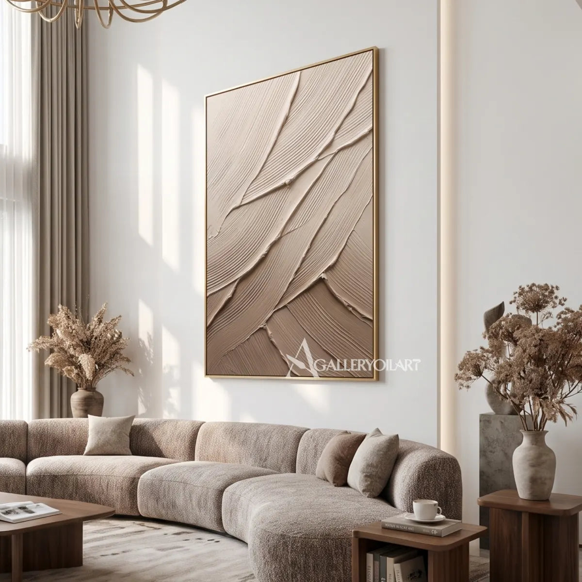 Layered-strokes-textured-3d-beige-wall-art-in-a-curved-sofa-room