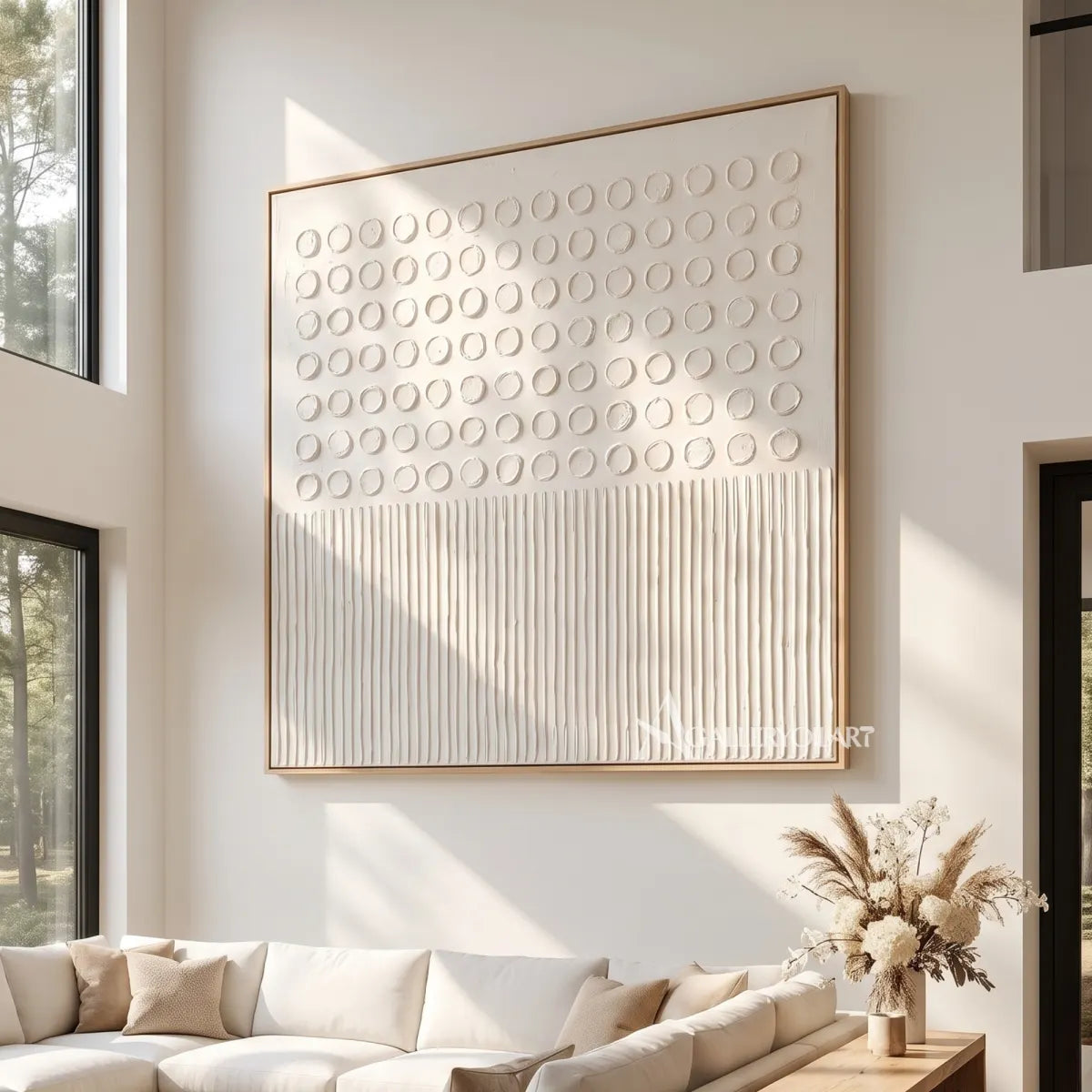 abstract-art-beige-circle-grid-above-sofa-in-a-neutral-living-room