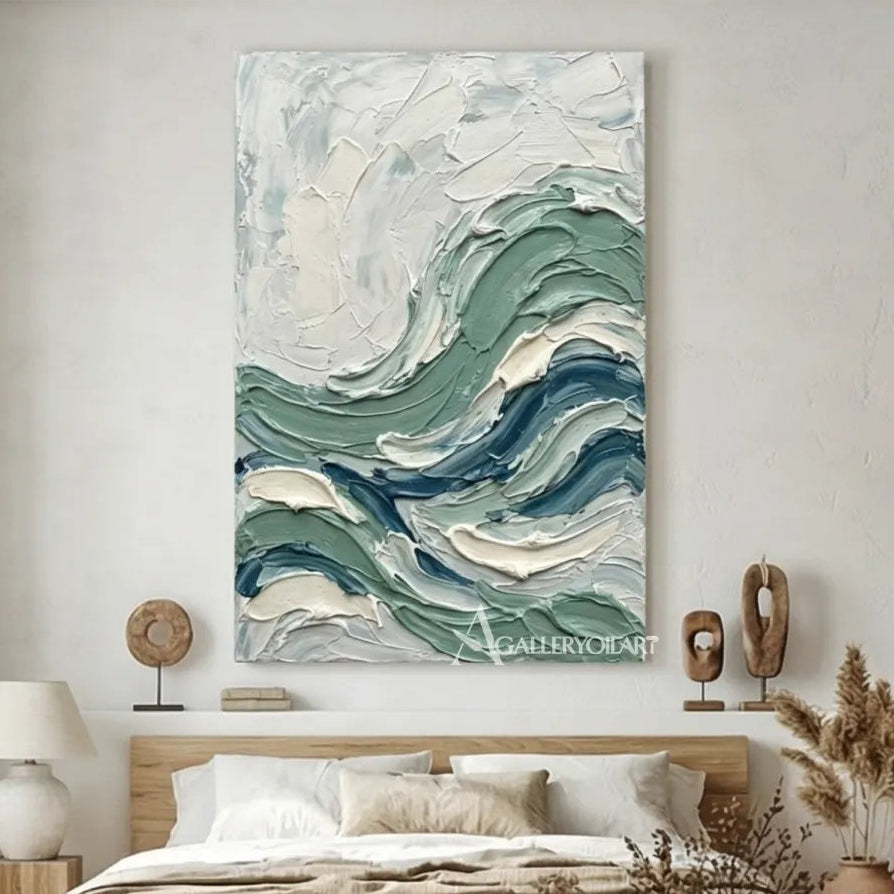 Textured-3D-ocean-wave-blue-and-white-wall-art-above-a-bedroom-console