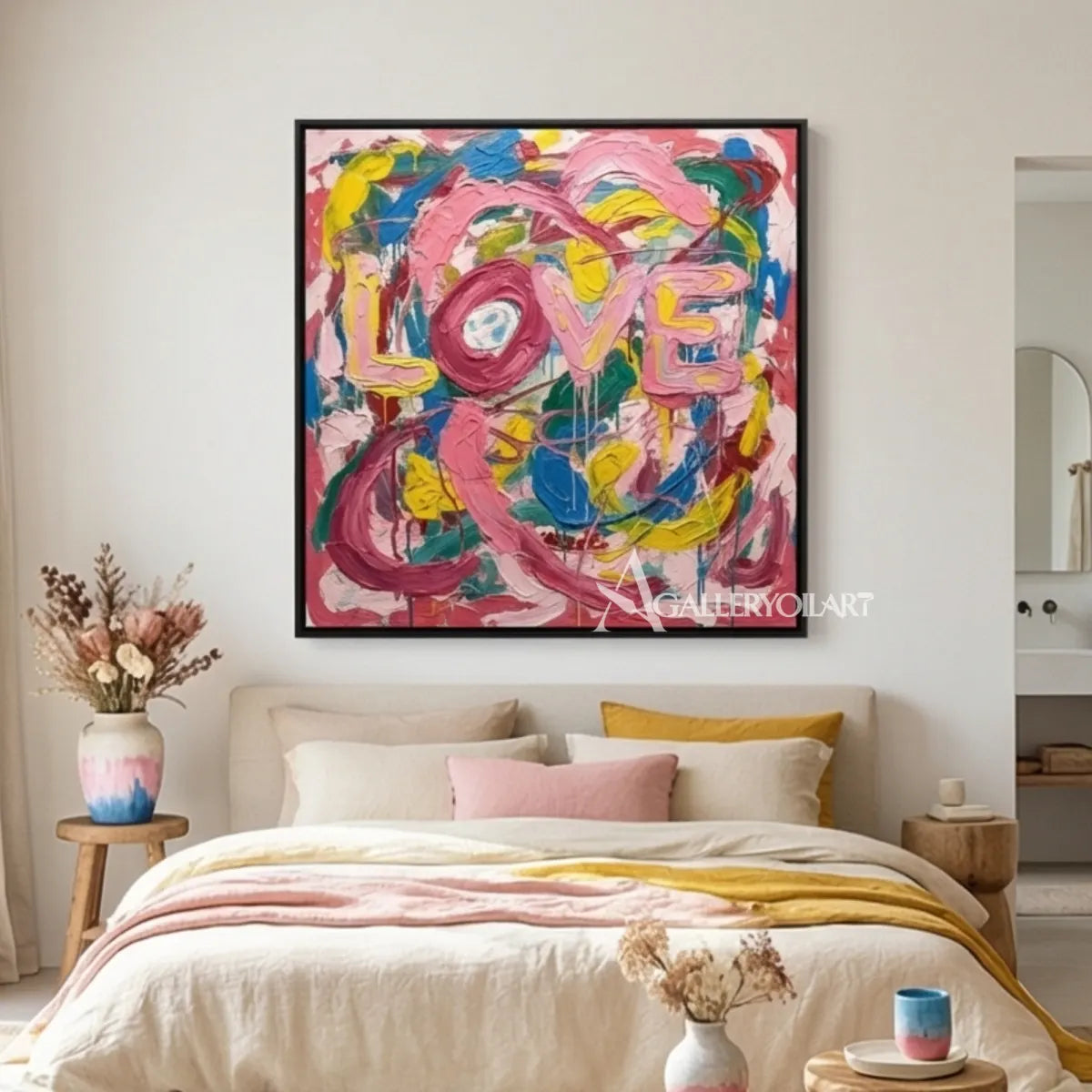Pop art painted LOVE letters in pink, blue, yellow, green, and white wall art in interior wall