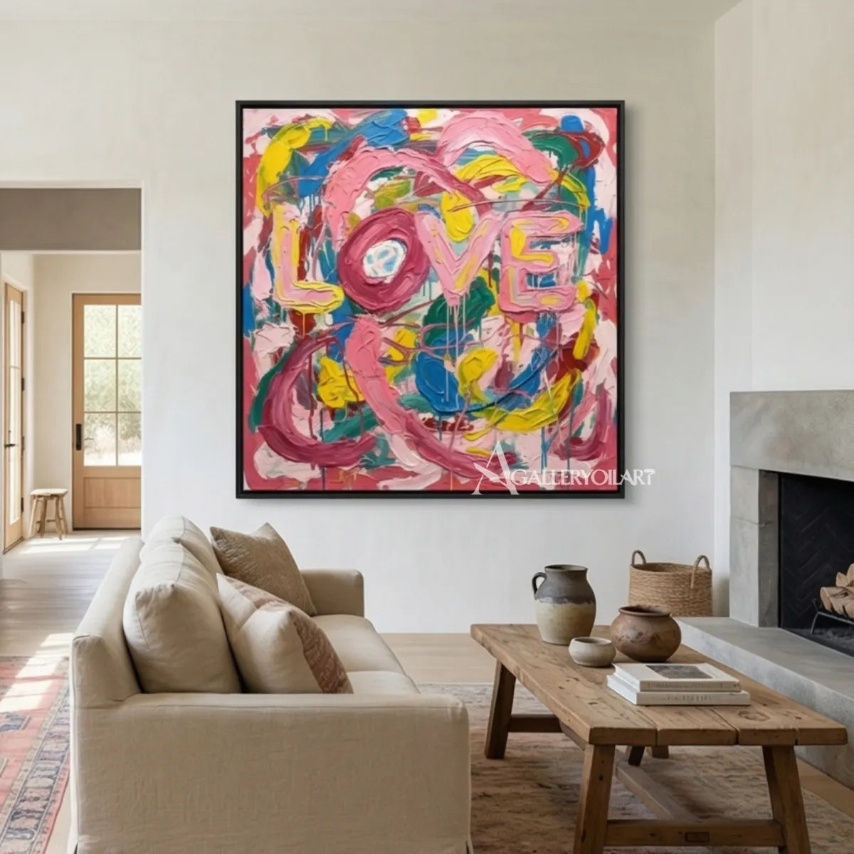 Pop art painted LOVE letters in pink, blue, yellow, green, and white wall art in living room