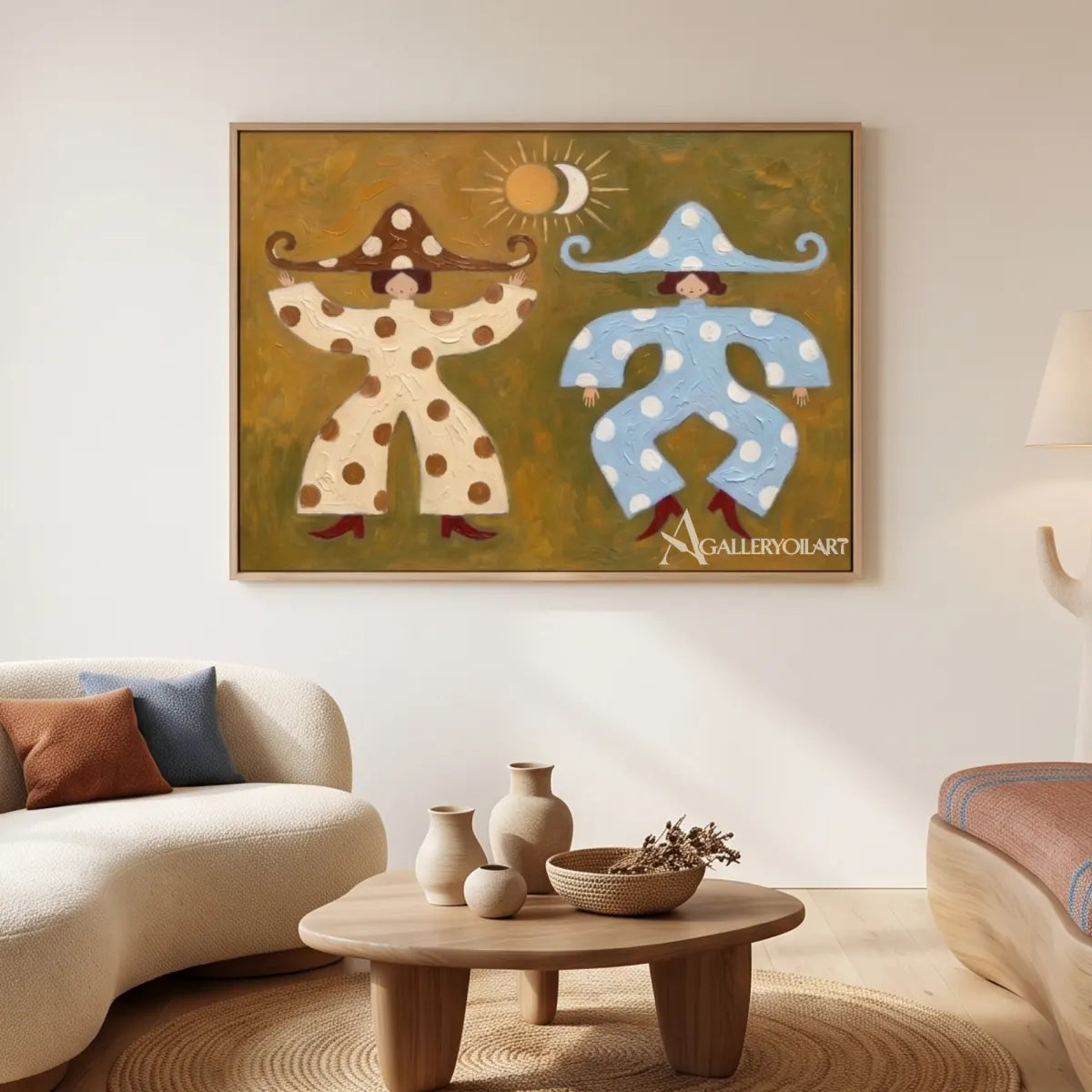 folk-art-figure-pair-on-a-brown-ground-hung-above-a-sofa