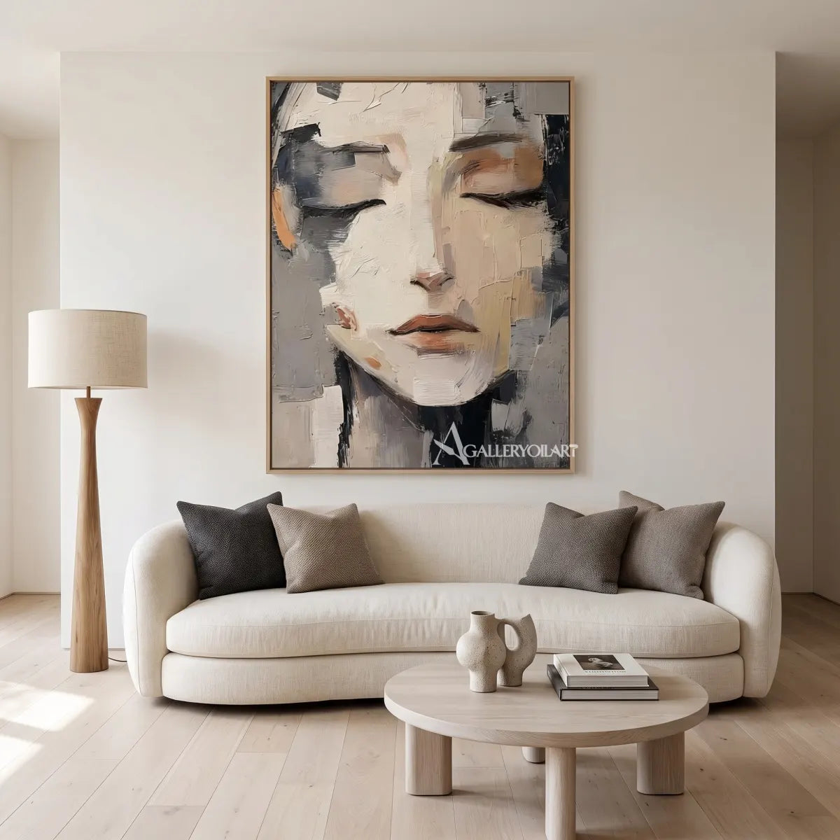 close-up-of-a-resting-woman-face-portrait-art-gray-and-ivory-wall-art-above-a-sofa