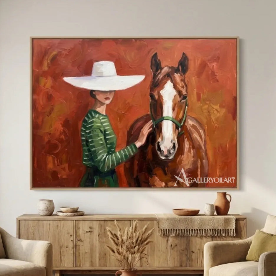 rider-in-a-pale-hat-on-a-chestnut-horse-in-green-portrait-art-displayed-in-a-double-height-room