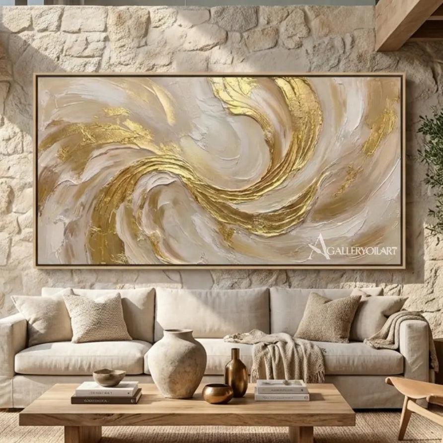 Textured-3D-sculpted-swirl-in-gold-and-cream-wall-art-in-a-contemporary-living-room