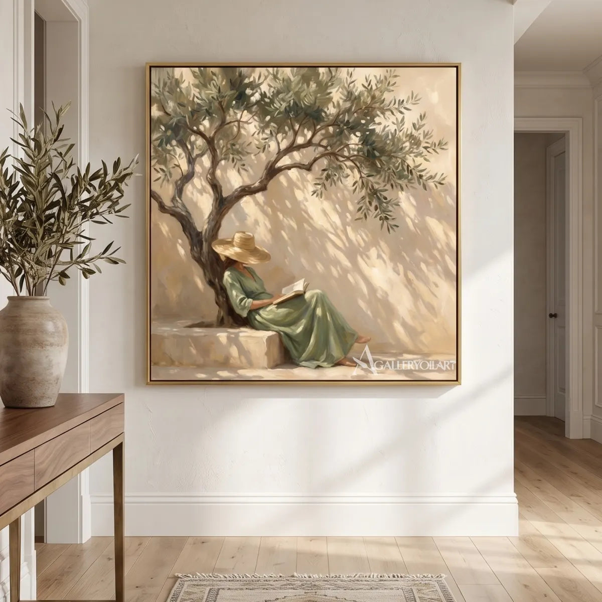 A seated reader beneath an olive tree in square Portrait Art displayed in a bright hallway, with beige and sage tones