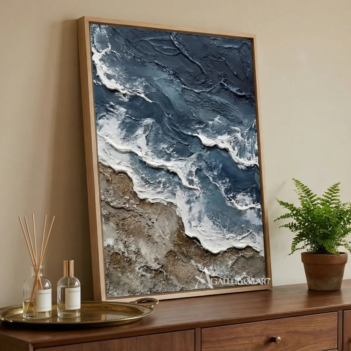 Dark-blue-shoreline-surge-sea-beach-art-above-a-wood-cabinet