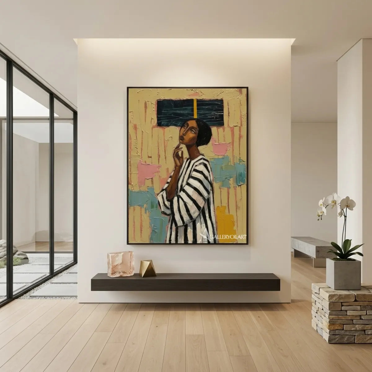 Portrait-art-painting-of-a-woman-in-a-black-and-white-striped-top-against-textured-yellow-and-teal-in-a-minimalist-room