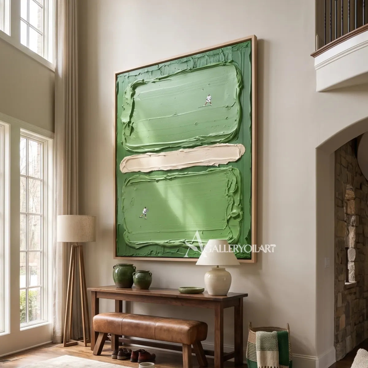 a textured green court with two tiny players in green and cream abstract art wall art in a gallery wall setting