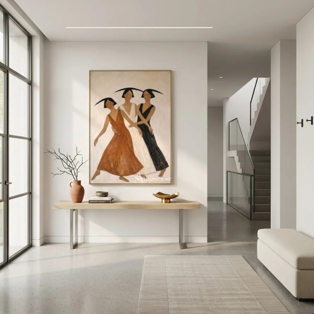 Three-women-dancing-portrait-art-displayed-in-a-modern-entryway-with-earthy-neutral-tones