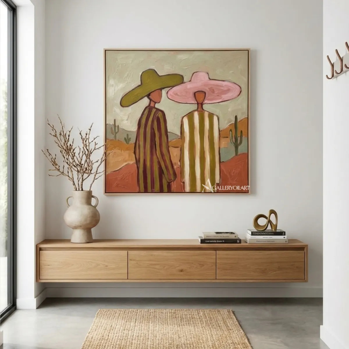 three-women-in-wide-hats-standing-together-in-green-portrait-art-displayed-in-a-entryway