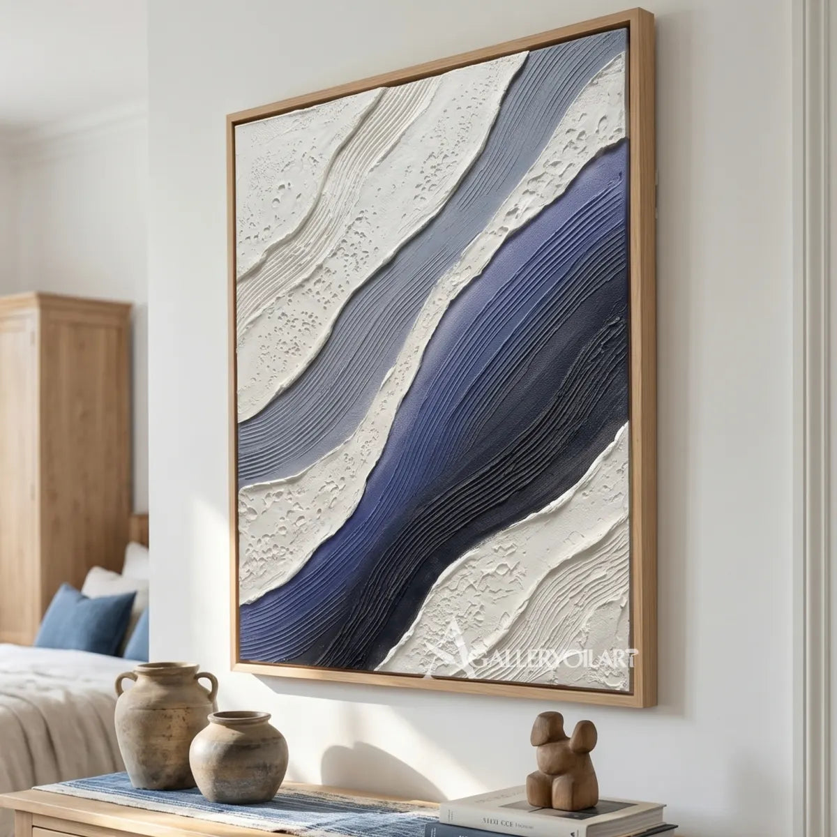 flowing raised bands sweeping diagonally across the canvas in blue and ivory textured 3d art wall art in a gallery wall setting