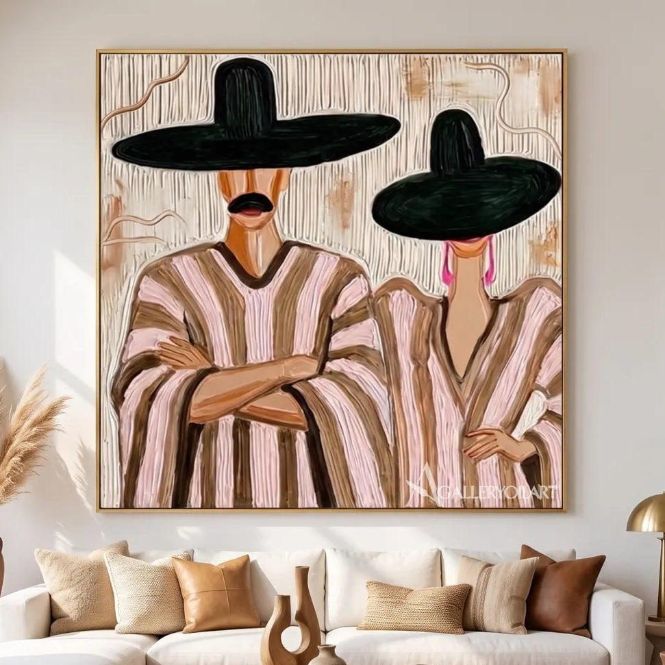 Two-figures-in-striped-ponchos-and-wide-dark-hats-in-a-beige-portrait-painting-over-a-sofa-in-a-gathering-room