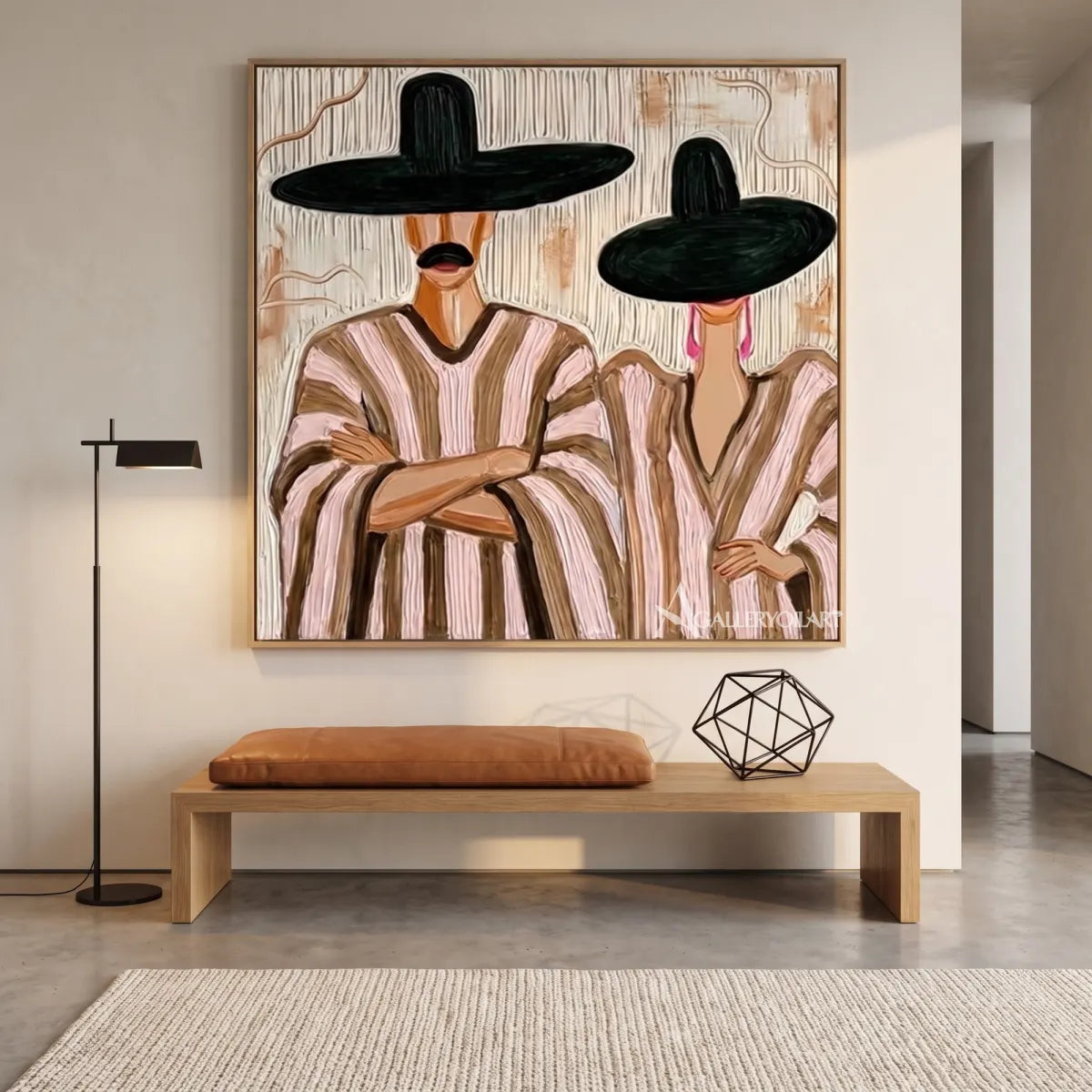 Two-seated-figures-under-broad-brims-in-a-painterly-beige-portrait-displayed-in-a-minimalist-interior