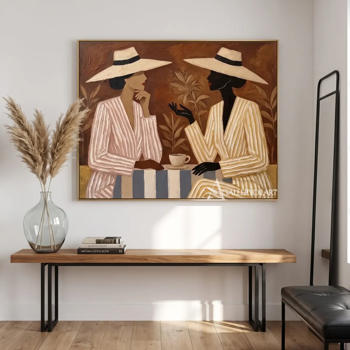 Two-women-in-striped-clothing-and-hats-in-a-beige-portrait-painting-in-a-modern-entryway