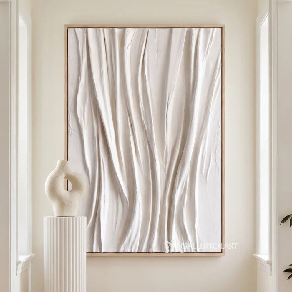 Textured 3D vertical draped rhythm in white relief in a modern hallway