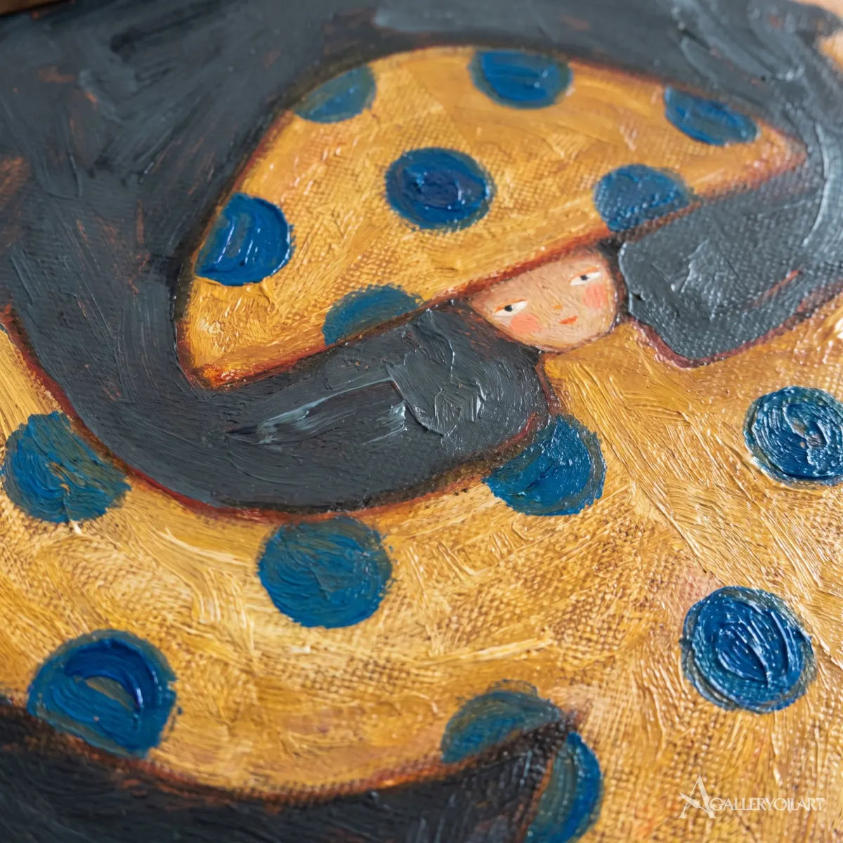 close-up-of-a-face-under-a-broad-dark-brim-in-navy-and-ochre-folk-art