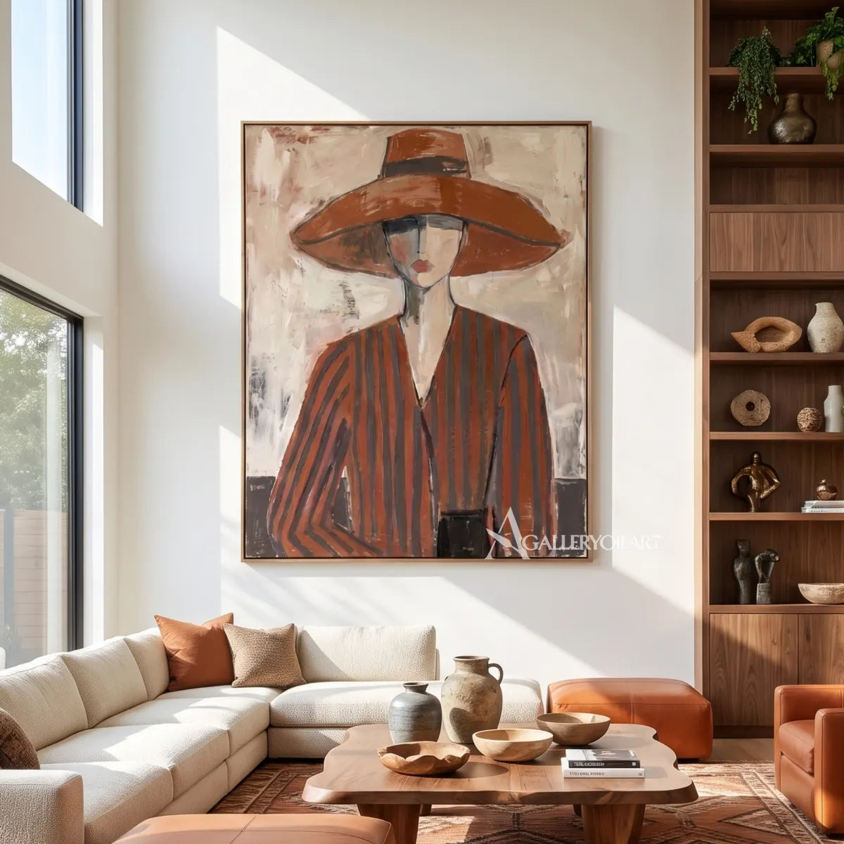 portrait-art-painting-of-a-woman-in-a-wide-brimmed-hat-and-striped-blouse-in-rust-brown-and-cream-in-a-contemporary-gathering-room