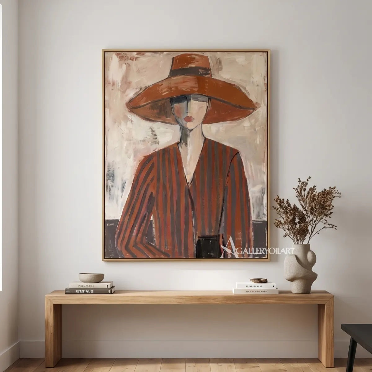 portrait-art-painting-of-a-woman-in-a-wide-brimmed-hat-and-striped-blouse-in-rust-brown-and-cream-in-a-modern-entryway