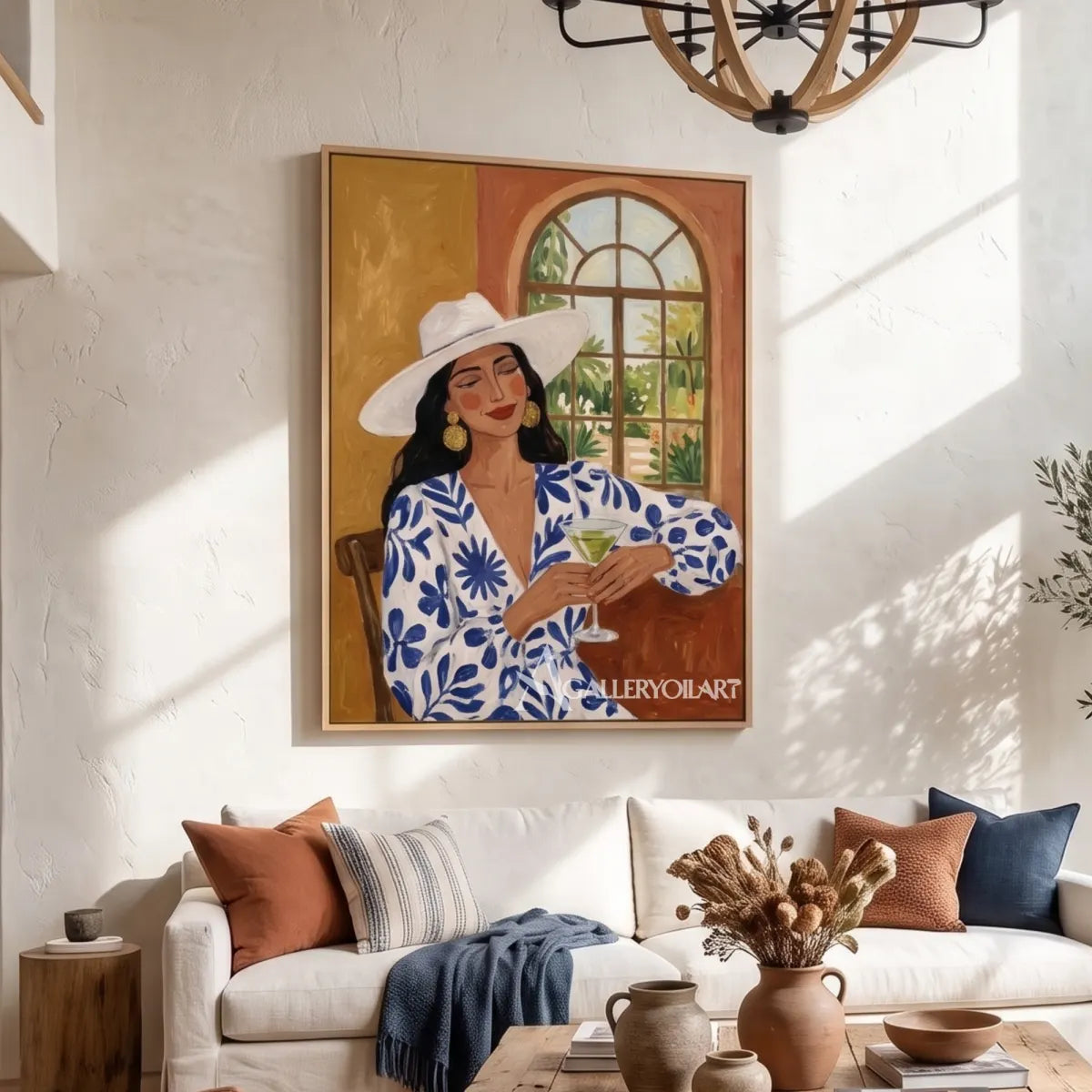 Woman-in-a-wide-hat-holding-a-glass-in-blue-accented-portrait-art-displayed-in-a-double-height-living-room