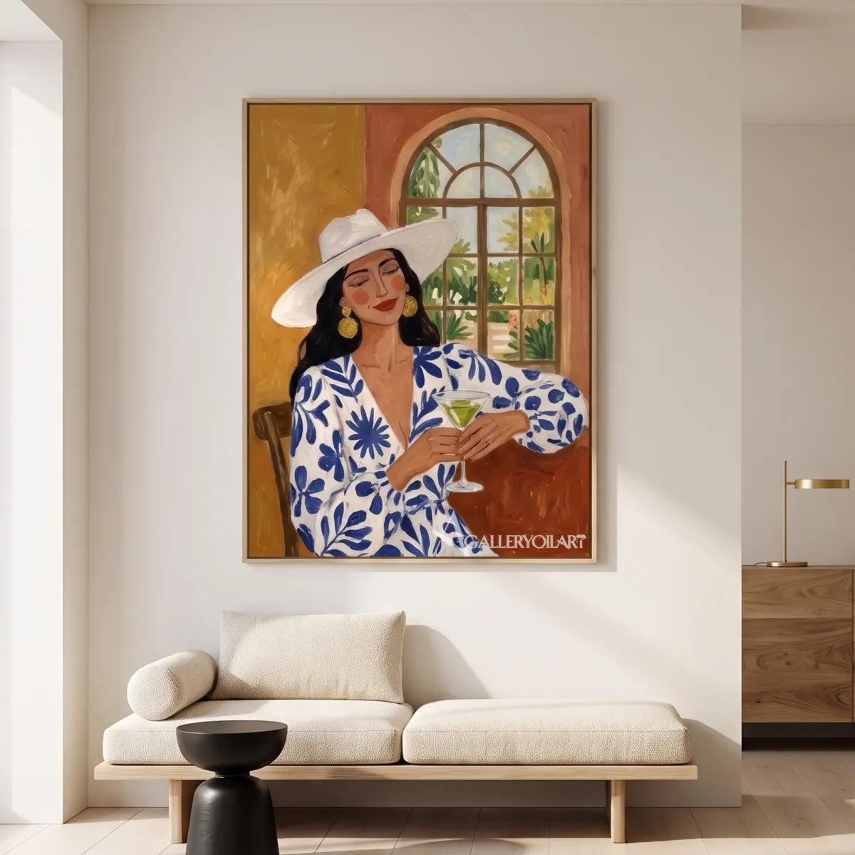 Woman-in-a-wide-hat-holding-a-glass-in-blue-accented-portrait-art-displayed-in-a-minimalist-interior