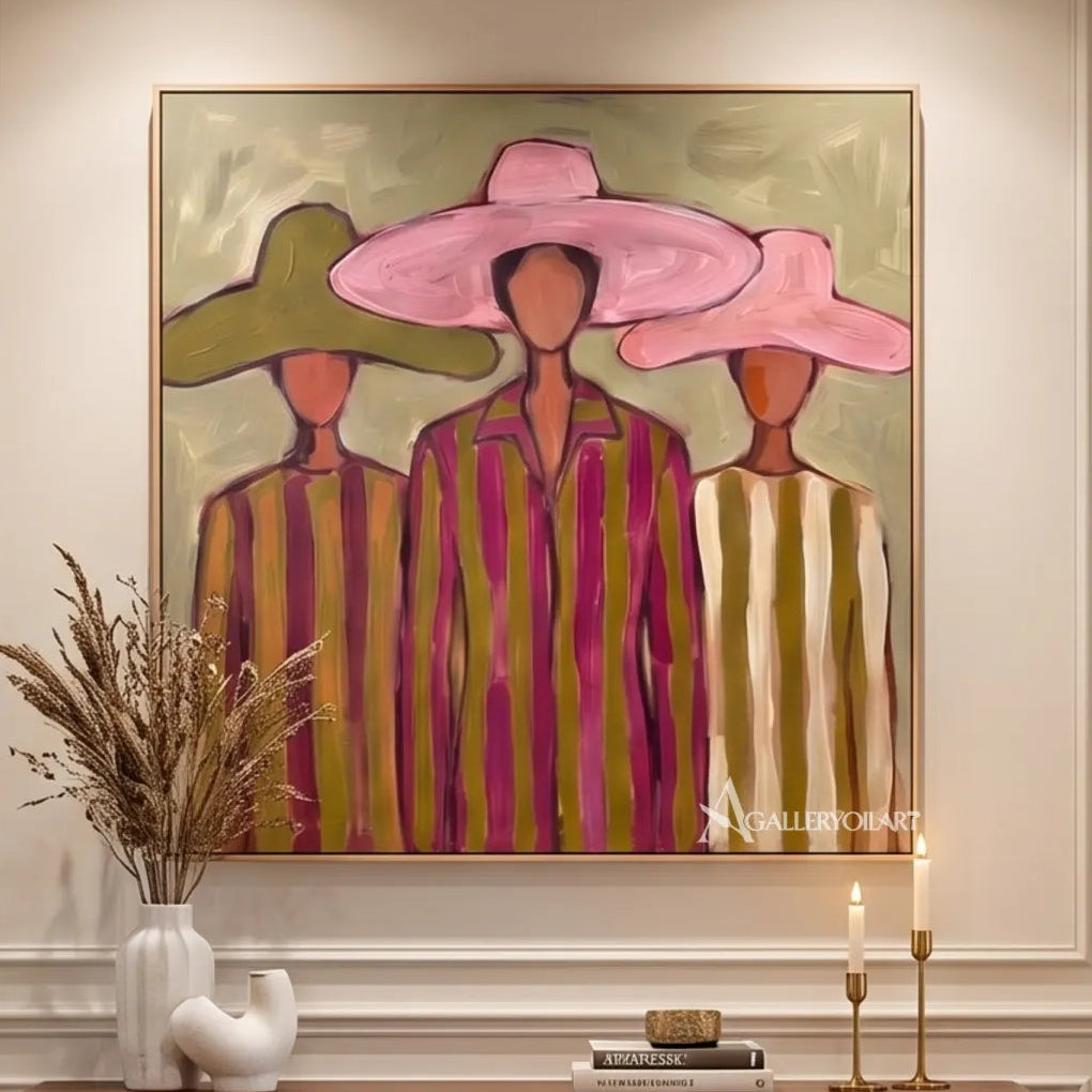 stylized-women-beneath-broad-brims-portrait-art-pink-and-olive-wall-art-in-a-dining-room