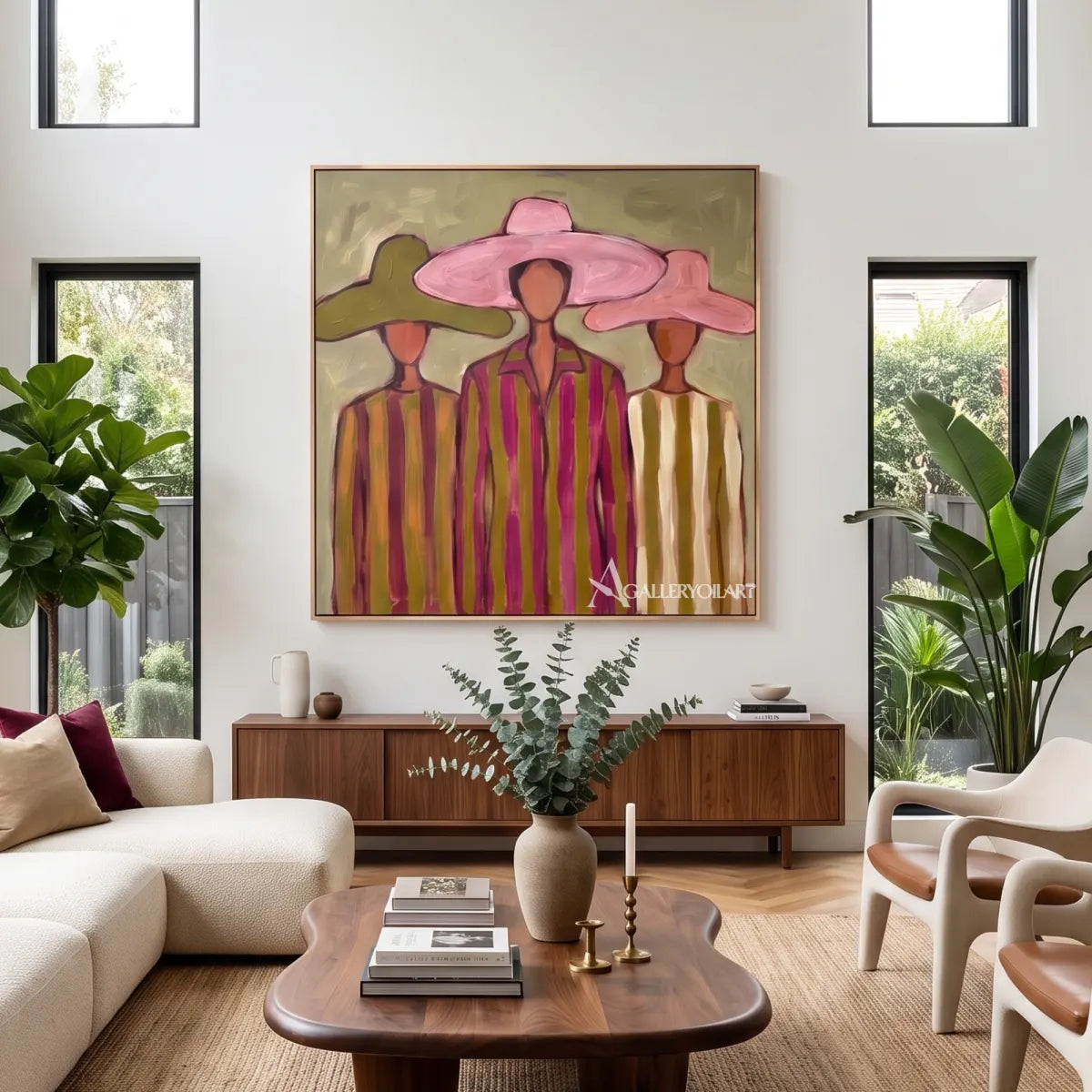 stylized-women-beneath-broad-brims-portrait-art-pink-and-olive-wall-art-in-a-bright-living-room