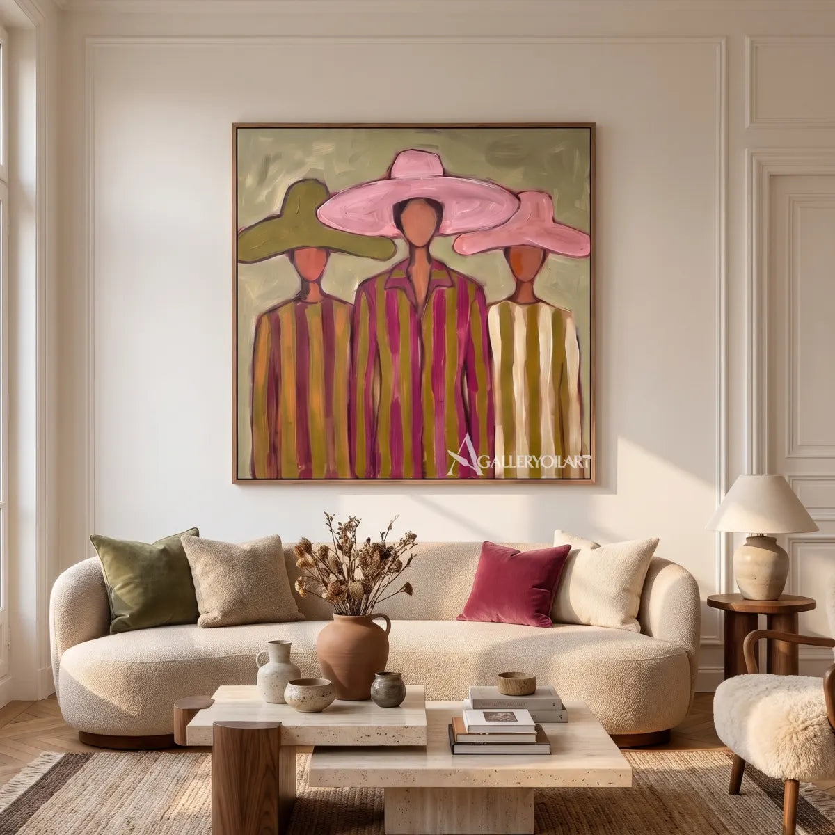 stylized-women-beneath-broad-brims-portrait-art-pink-and-olive-wall-art-in-a-neutral-living-room