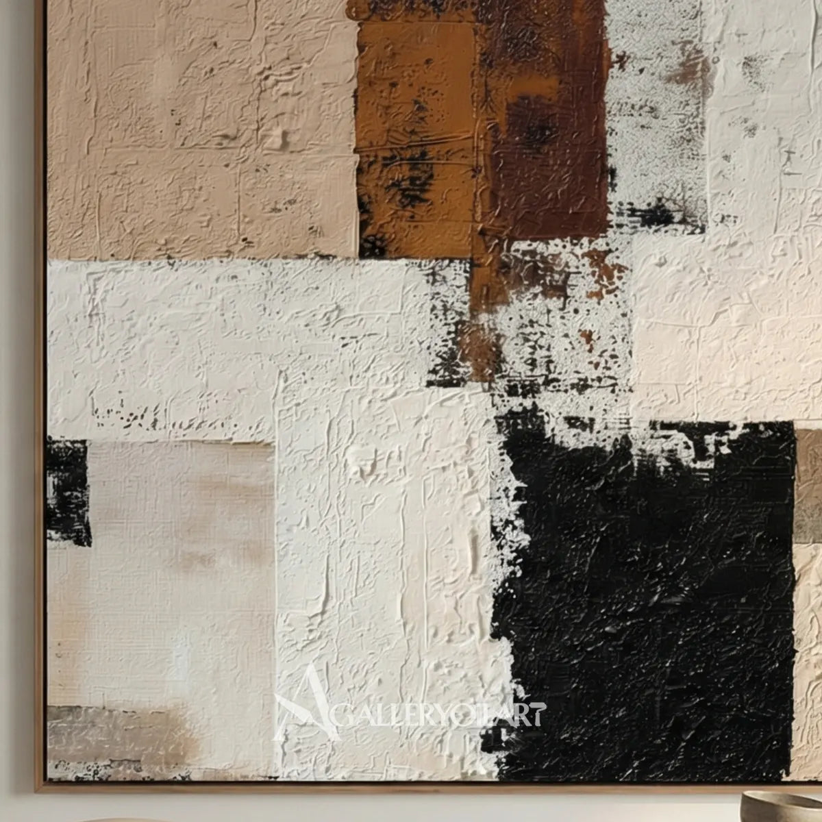 close-view-of-textured-abstract-geometric-blocks-in-black-cream-and-brown-in-an-art-studio