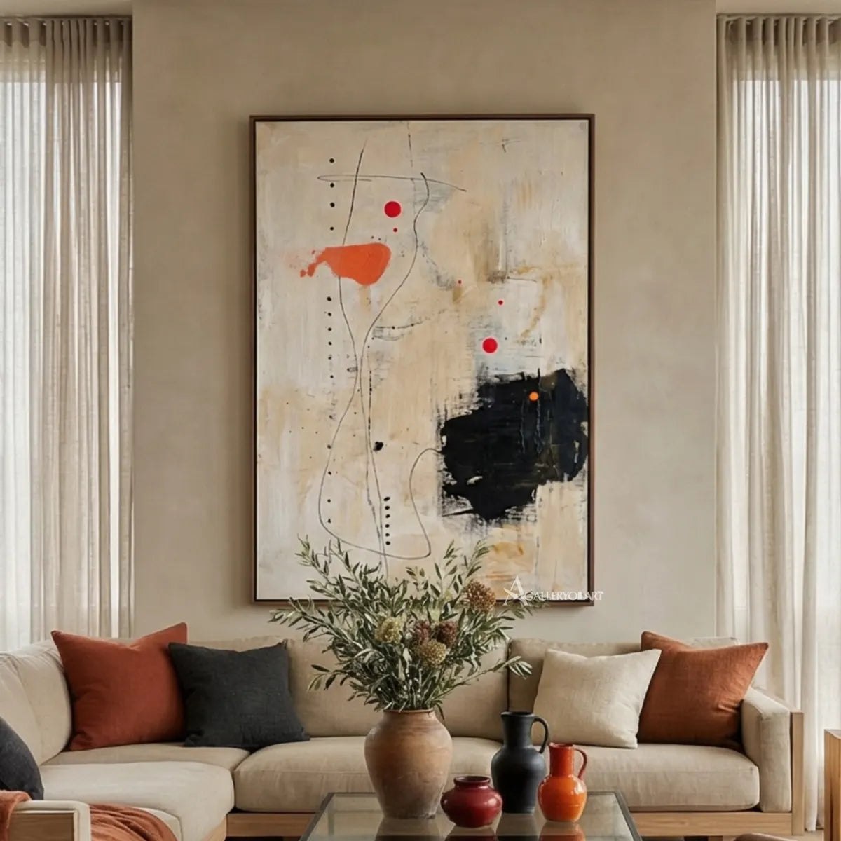 abstract-layered-abstract-marks-cream-soft-gray-charcoal-black-and-vivid-orange-wall-art-in-sofa-room