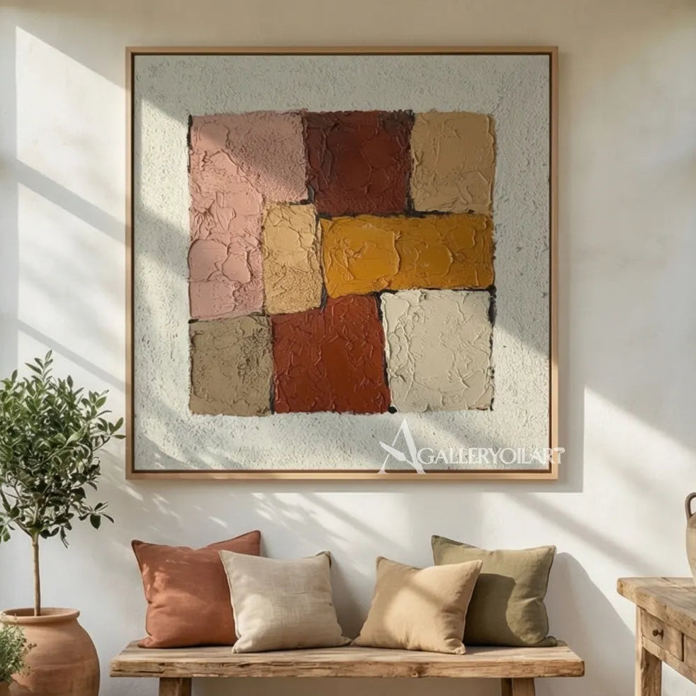 textured-abstract-color-blocks-in-rose-terracotta-ochre-and-ivory-in-a-sunlit-living-room