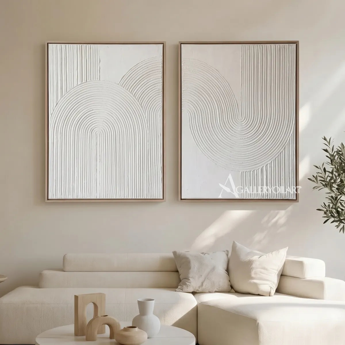 White raised arched pair diptych wall art above a console