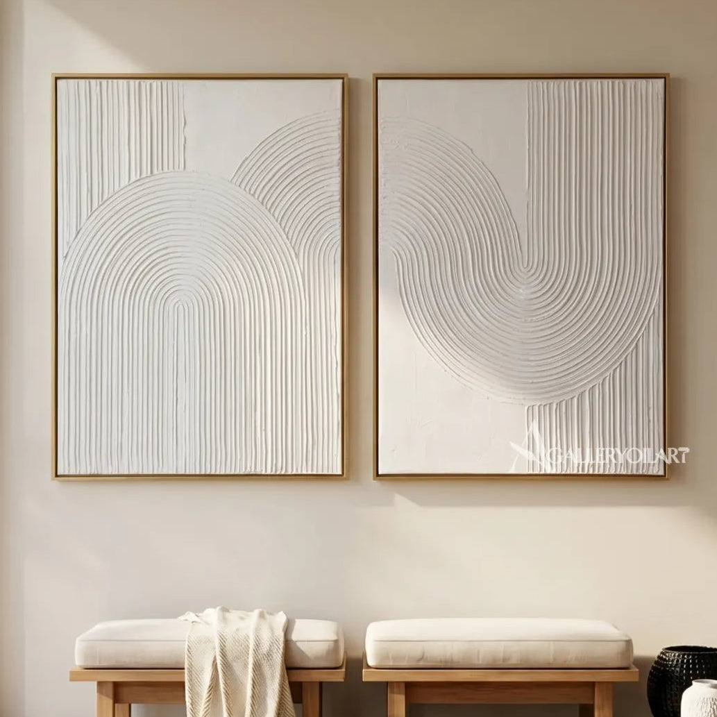 White raised arched pair diptych wall art in a modern interior