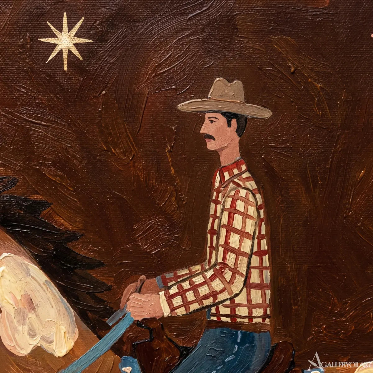 Close-view-of-Western-cowboy-art-showing-a-rider-on-a-horse-against-a-textured-dark-brown-ground
