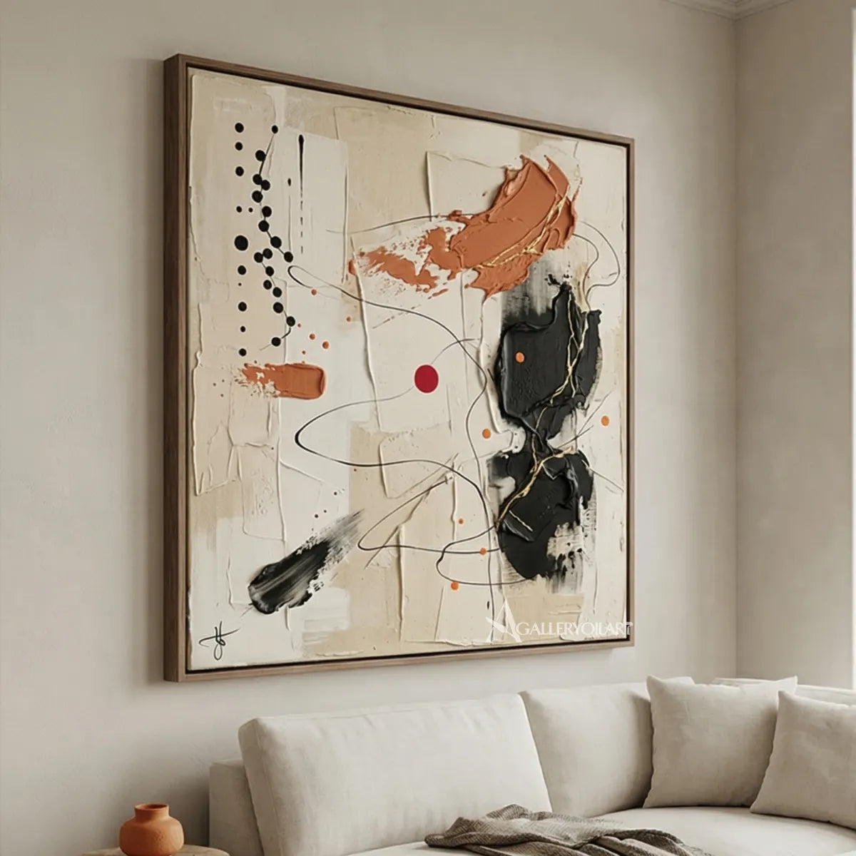 abstract-art-charcoal-and-cream-composition-above-a-sofa-in-a-neutral-living-room