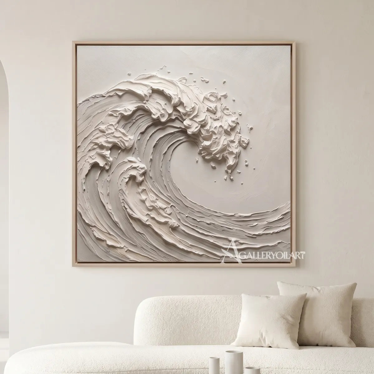 Sea beach art showing a sculpted curling wave in warm beige tones in a minimalist living room