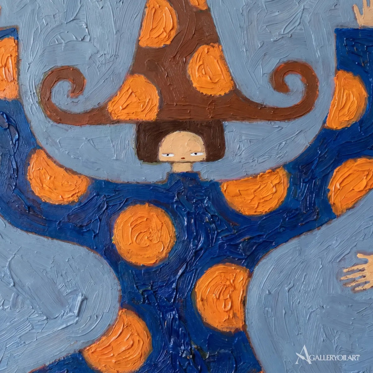 folk-art-pair-above-a-sofa-in-a-relaxed-room-with-blue-and-orange-colors