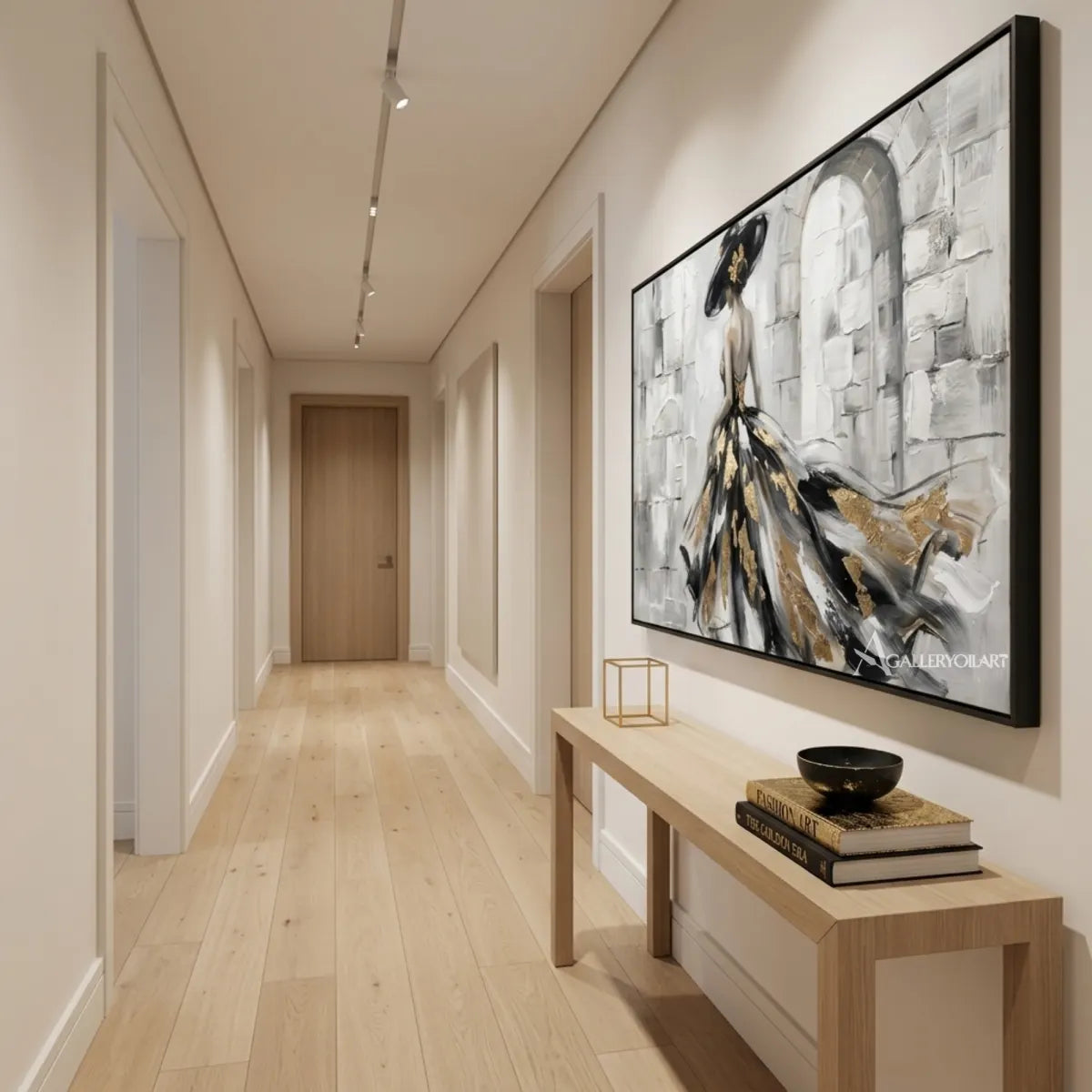 Woman-in-a-flowing-black-and-gold-gown-portrait-art-in-a-modern-transitional-room-with-gray-and-gold-tones