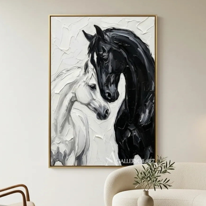 Animal-art-of-black-and-white-horses-displayed-in-a-neutral-living-room