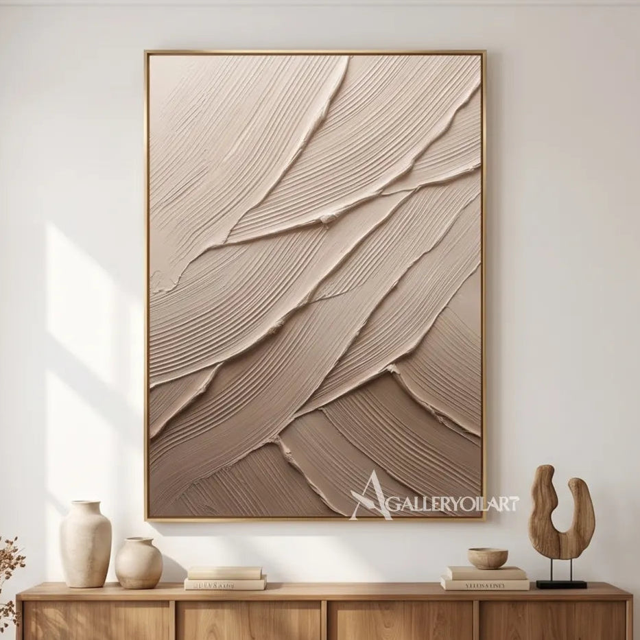 Layered-strokes-textured-3d-beige-wall-art-above-a-sideboard