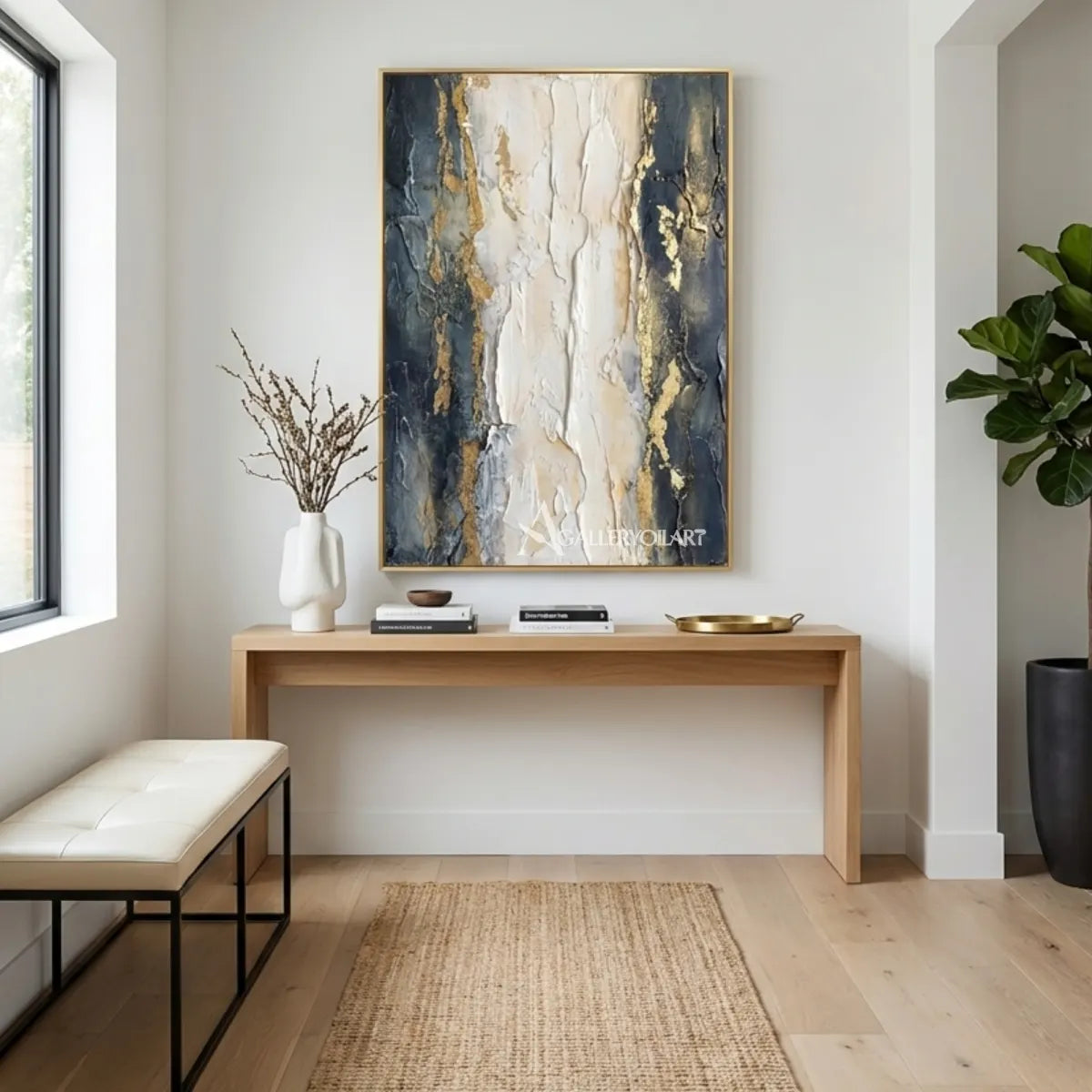 Textured-3D-gray-and-gold-marble-relief-wall-art-in-a-bright-entryway