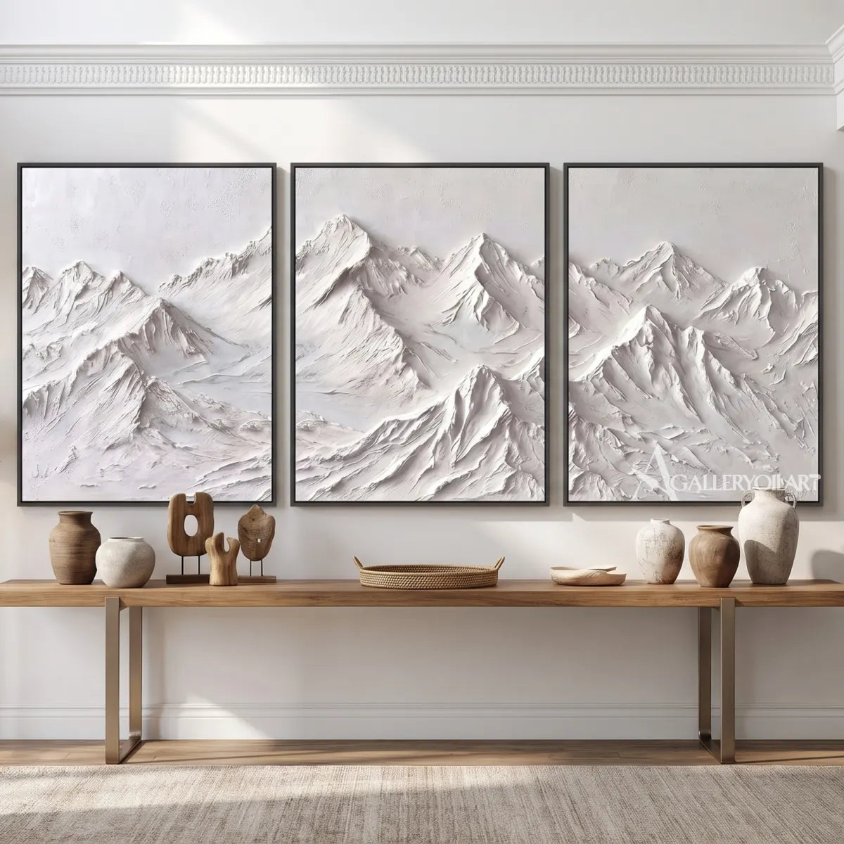 White-textured-mountain-ridge-triptych-above-a-minimal-console