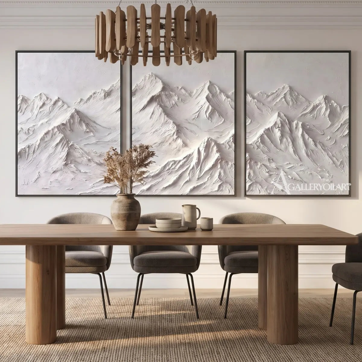 White-textured-mountain-ridge-triptych-above-a-wood-dining-table